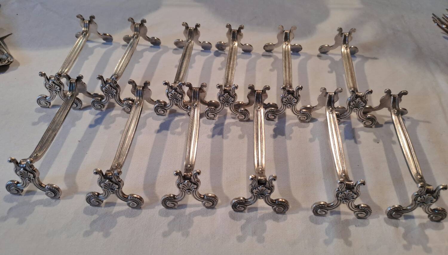 12 Christofle silver metal knife holders, Vendôme model