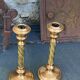 Set of two candlesticks in brass dore, pattern of ivy leaves chiseles on the columns, vintage