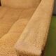 Old velvet heating chair on metal legs
