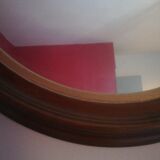 Oval mirror in wood and gold