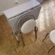 Small stools in metal and faux leather.