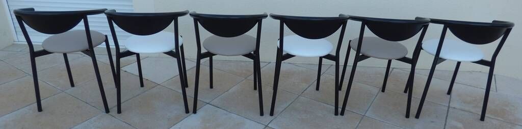 6 gondola-style chairs with a metal structure for indoor and outdoor use.