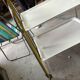 Vintage folding dessert table in chrome metal with enamelled trays.