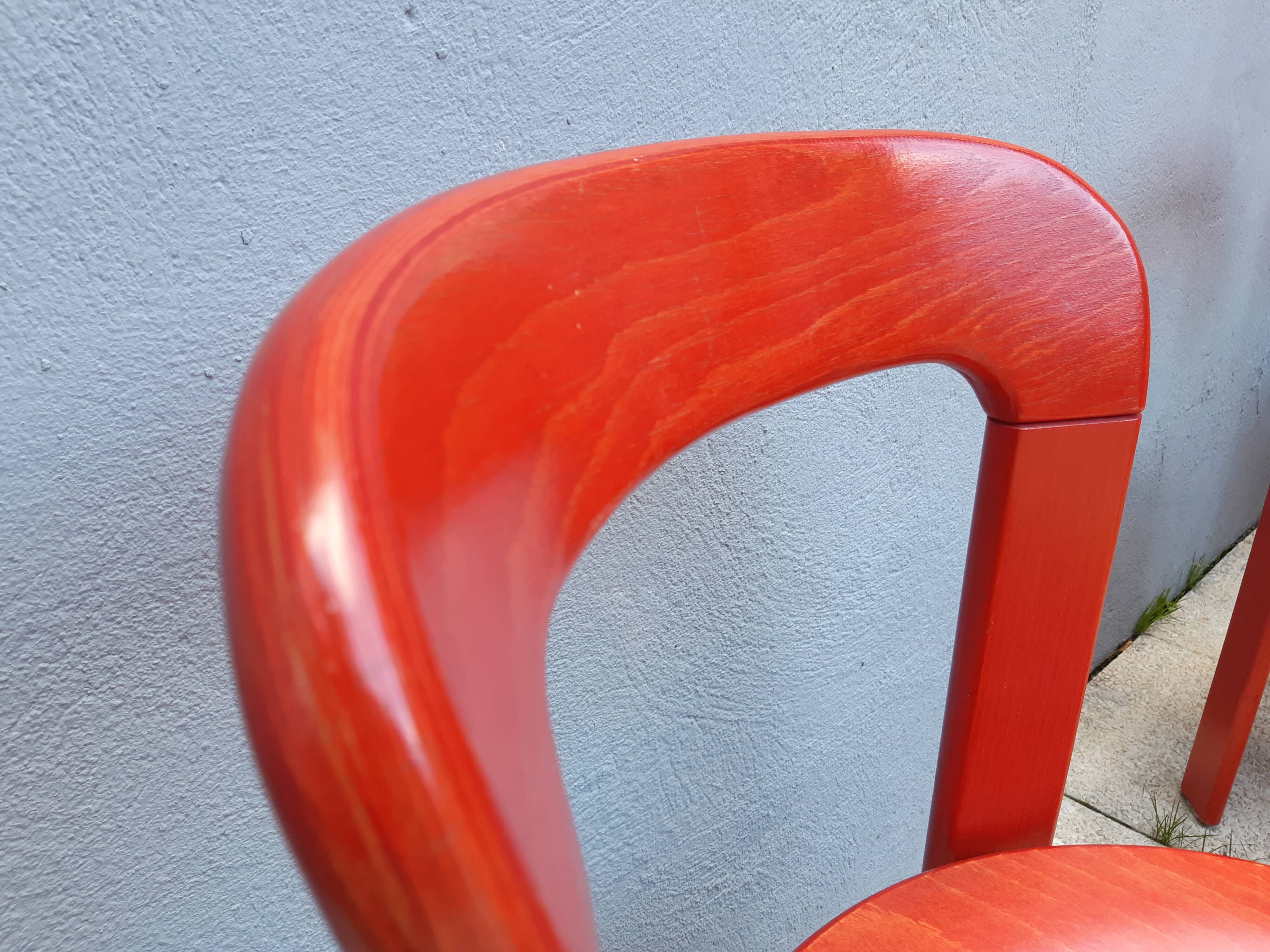 Set of 10 red wooden chairs by Bruno Rey for Kusch&Co