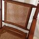 Fauteuil pliant en bambou, cannage, cuir et laiton