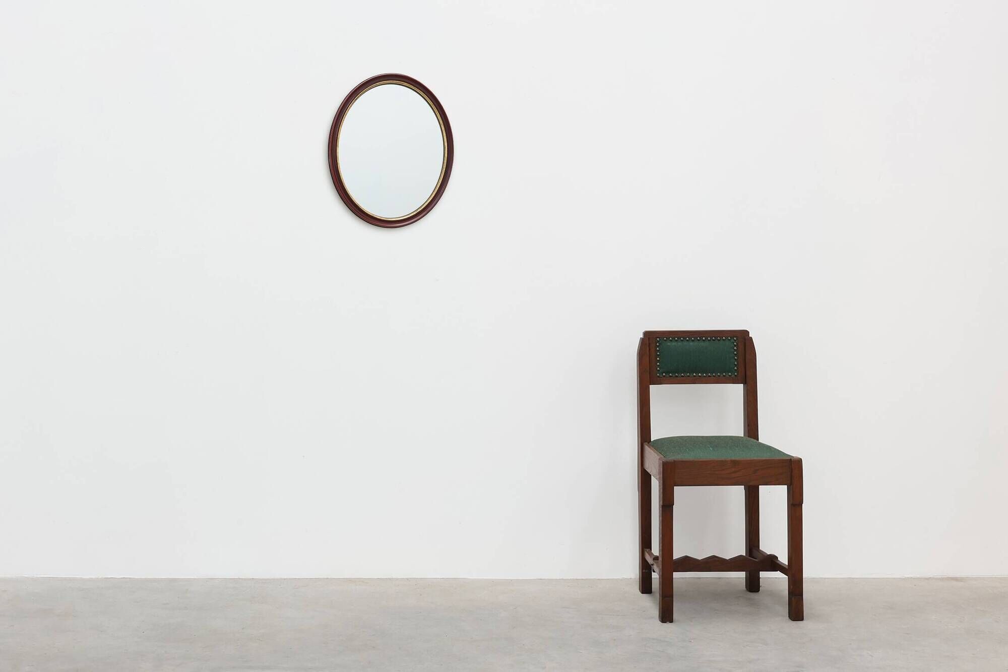 French Burgundy Lacquered Oval Mirror with Gilt Inner Edge, circa 1920