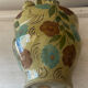 Mediterranean ceramic jug with floral decoration.