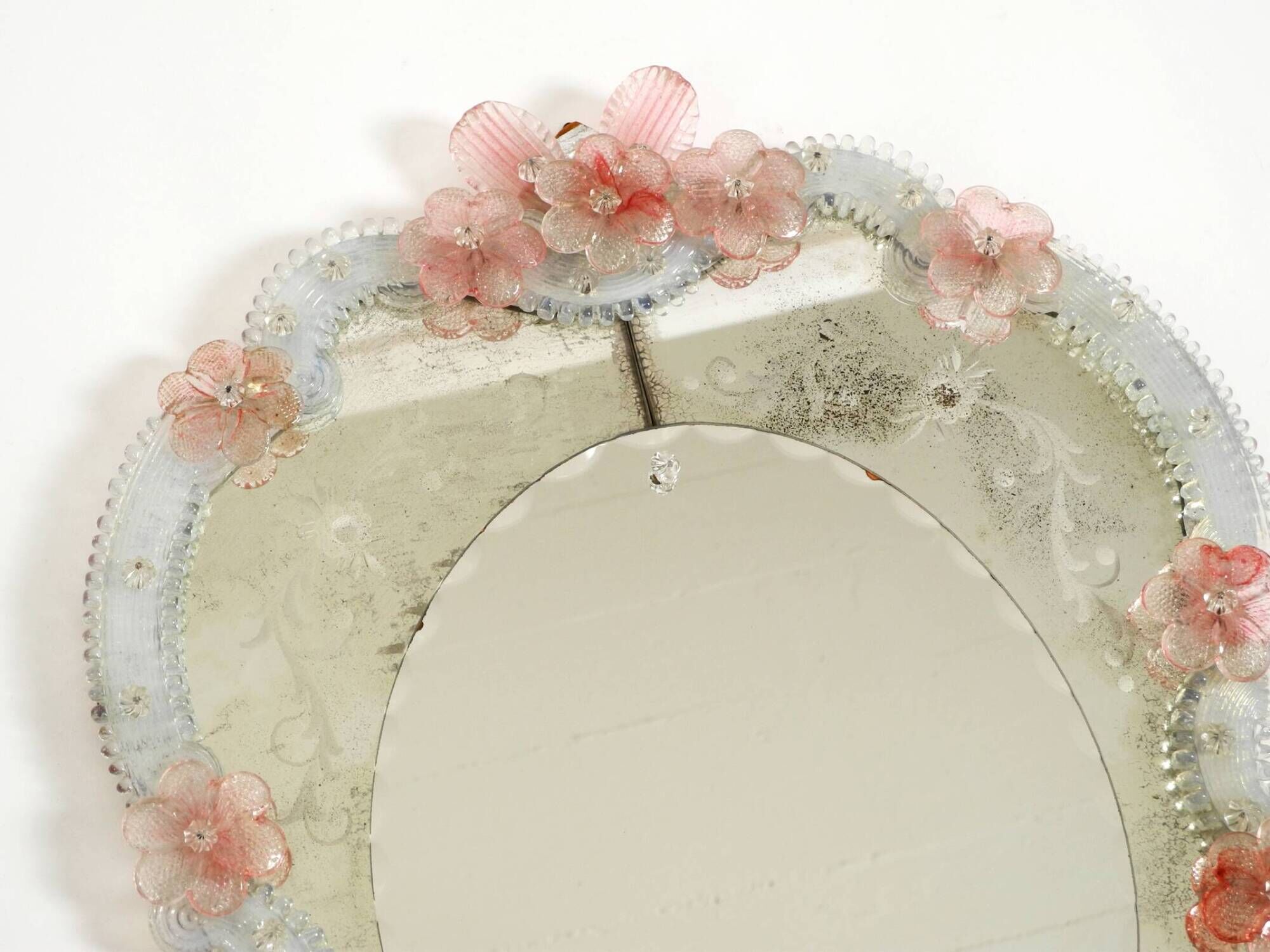 Italian mid-century wall mirror with a Murano glass frame and blossoms