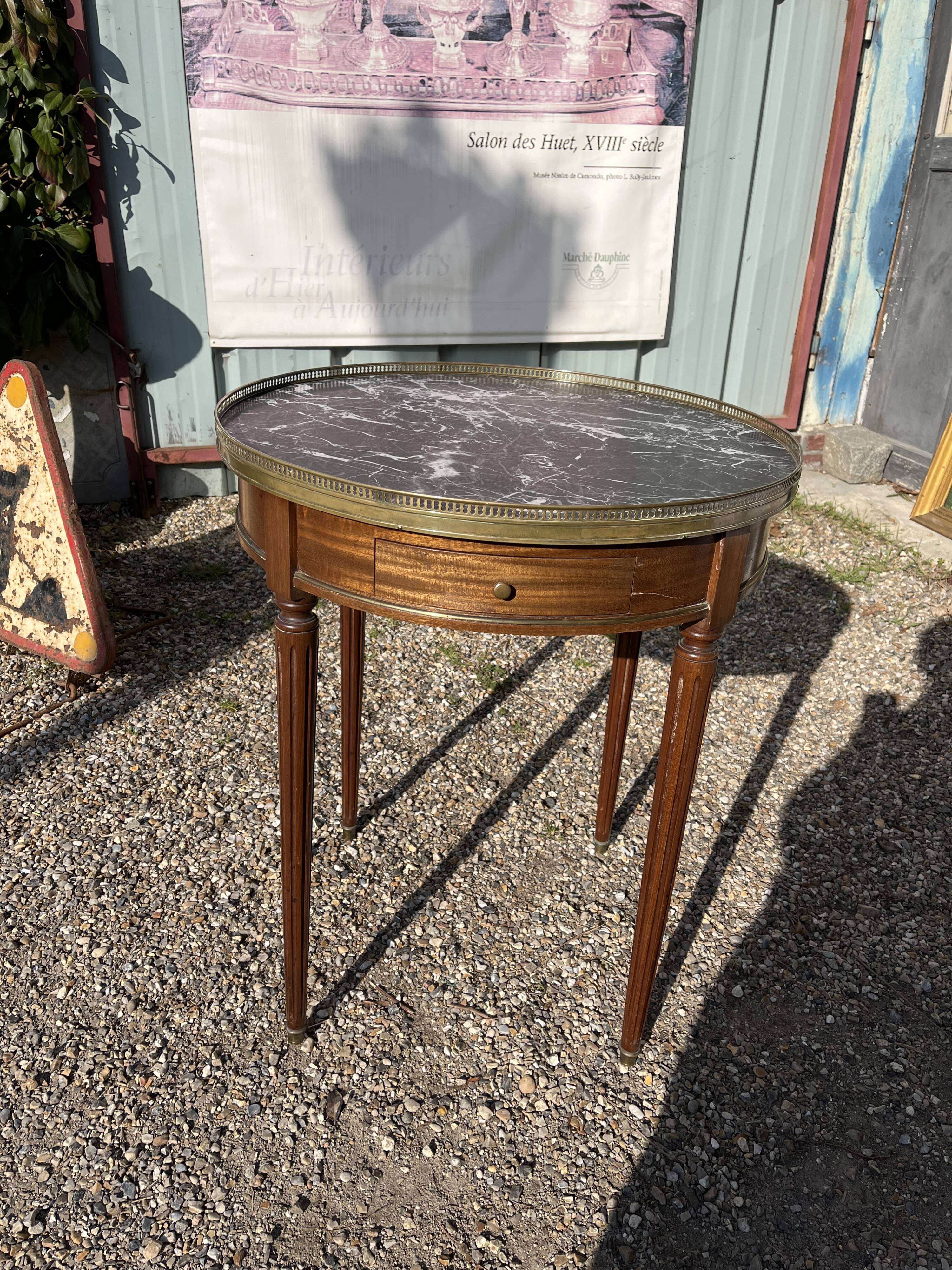 Mahogany hot water bottle table with brass net
