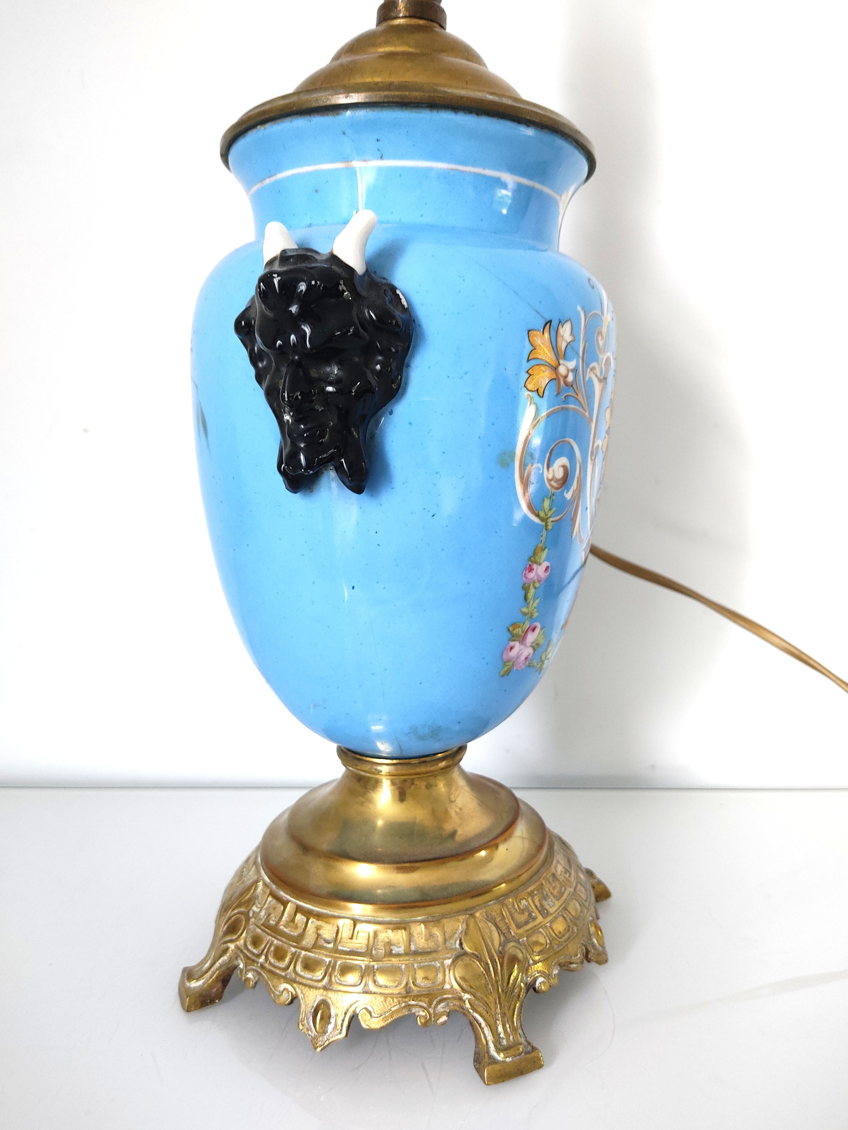 Lamp foot blue vase heads of fauna