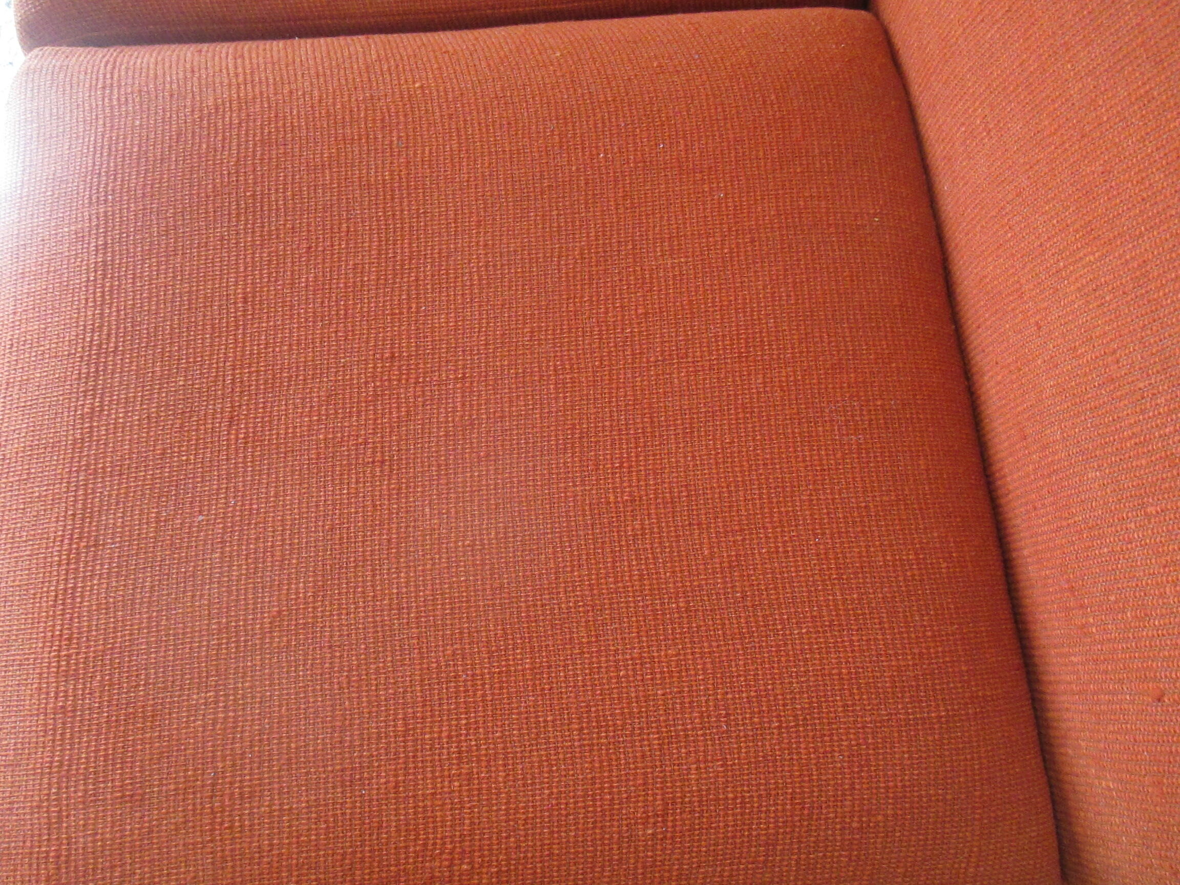 Scandinavian orange wool sofa