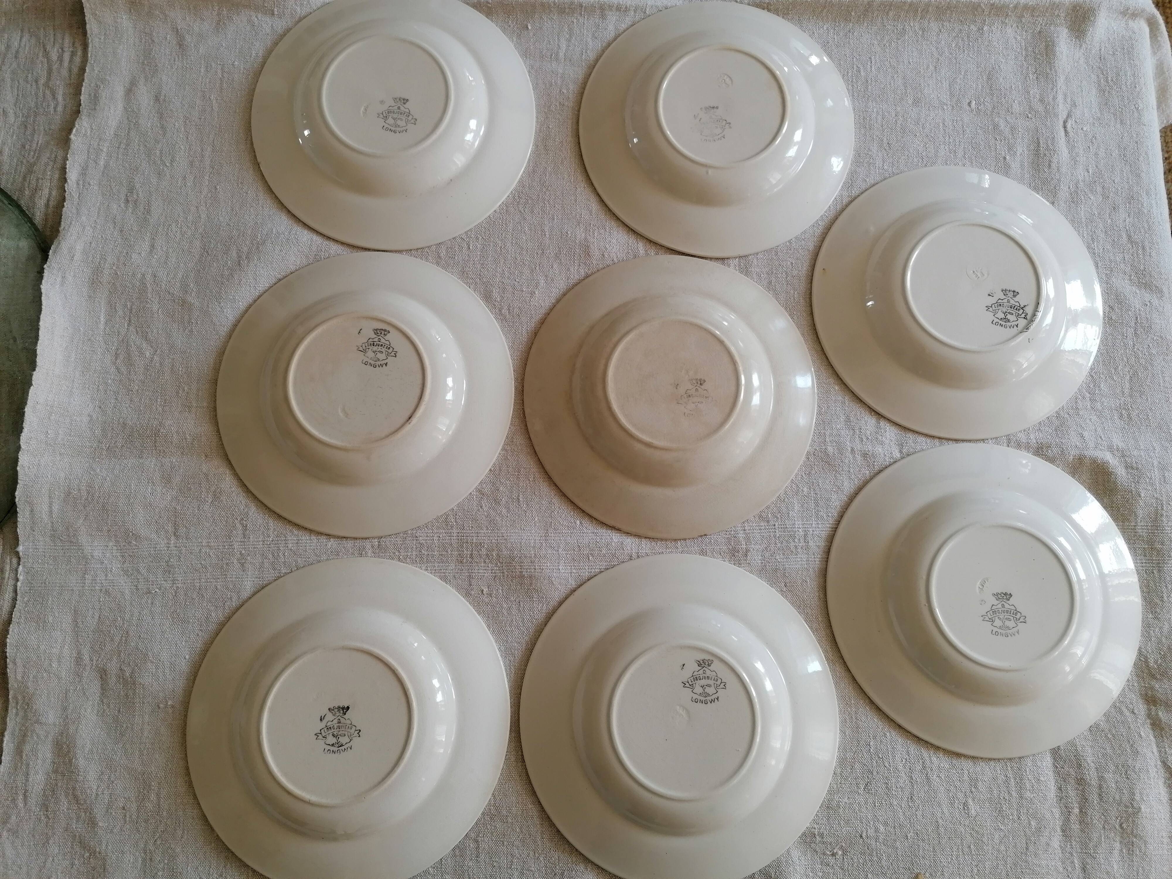 Lot de 8 assiettes creuses en faïence de Longwy