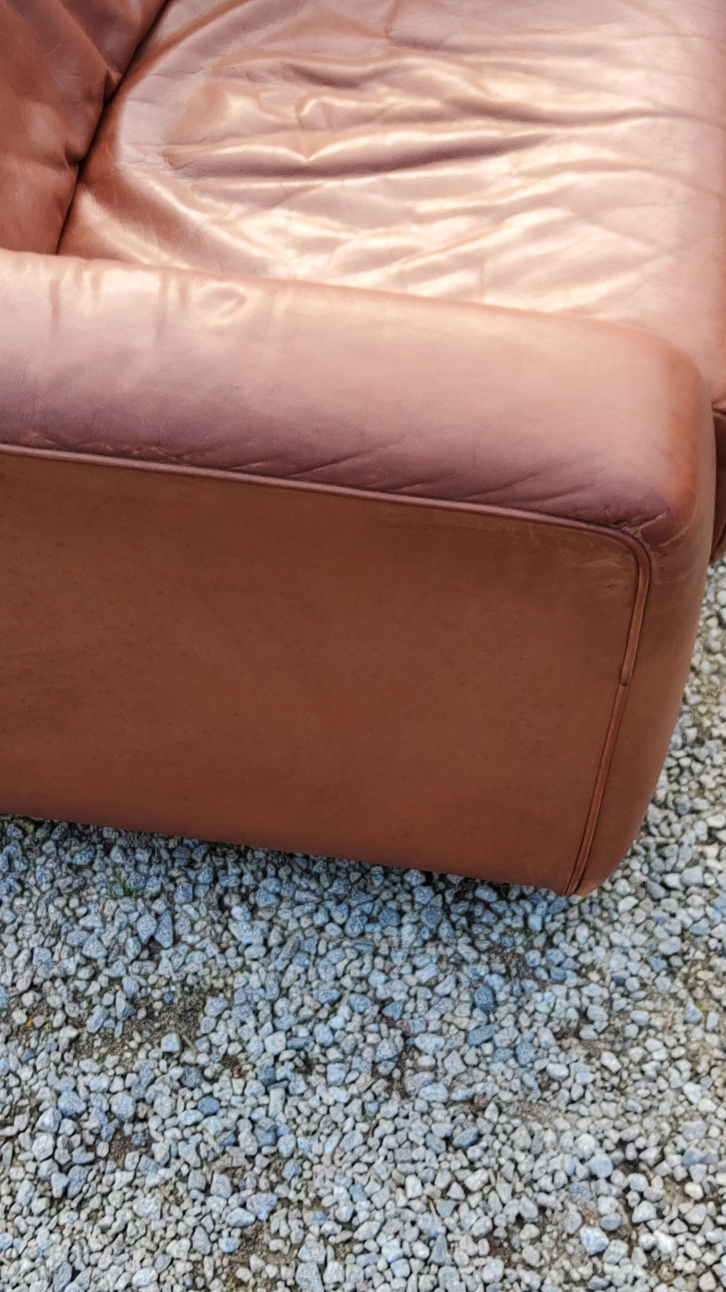 Pair of armchairs and De Sede sofa in cognac leather from the 70s/80s