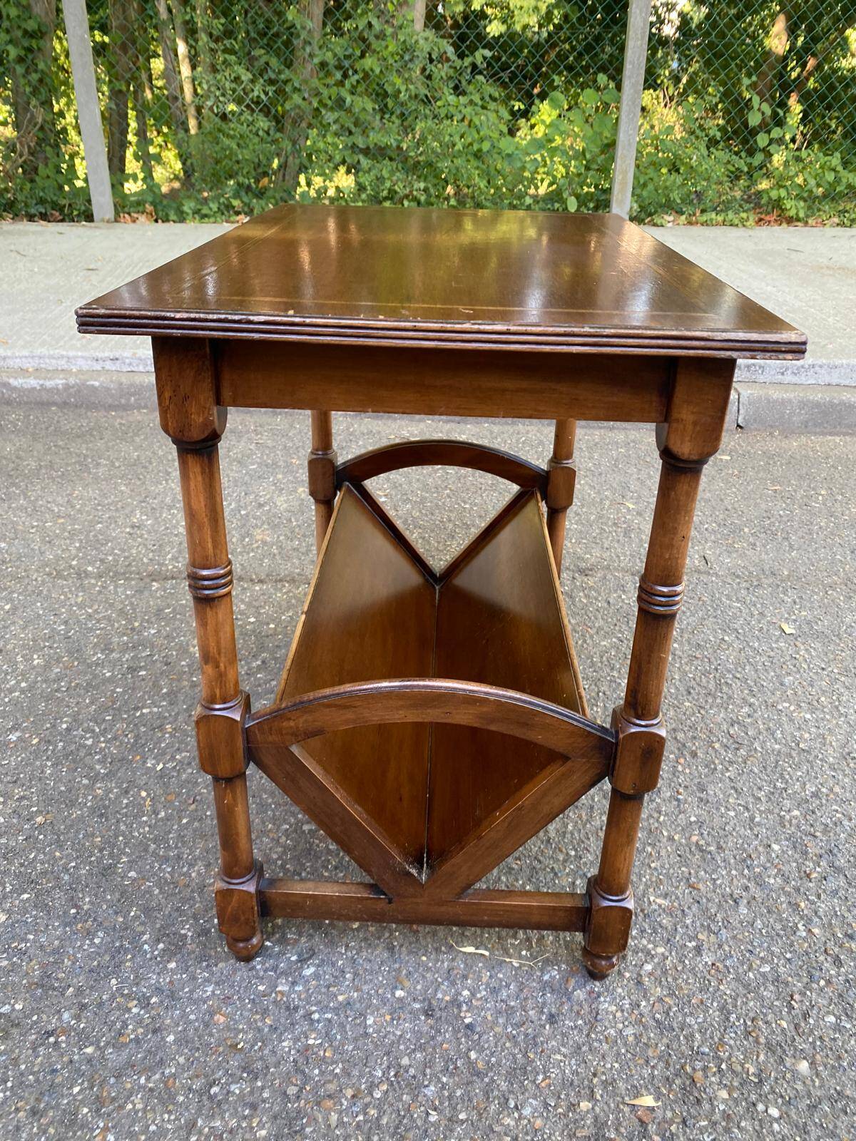 Wooden side table magazine rack in neo-classical English style.