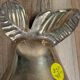 Small vintage brass trinket dish in the shape of a pear.