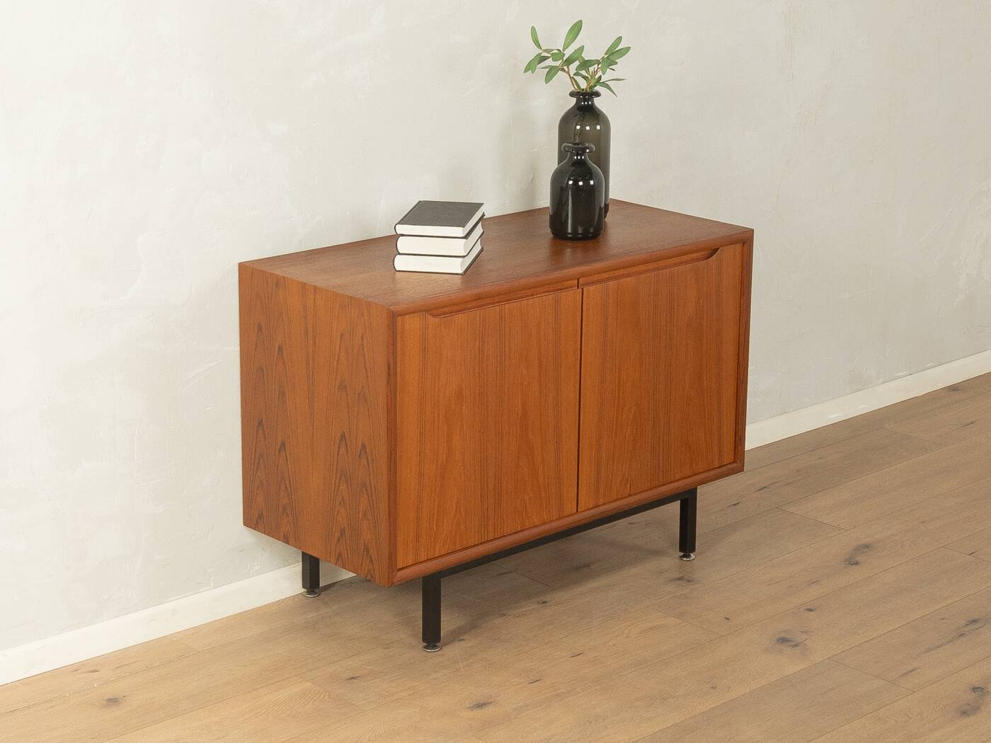 Classic chest of drawers from the 1960s with practical, closed storage space