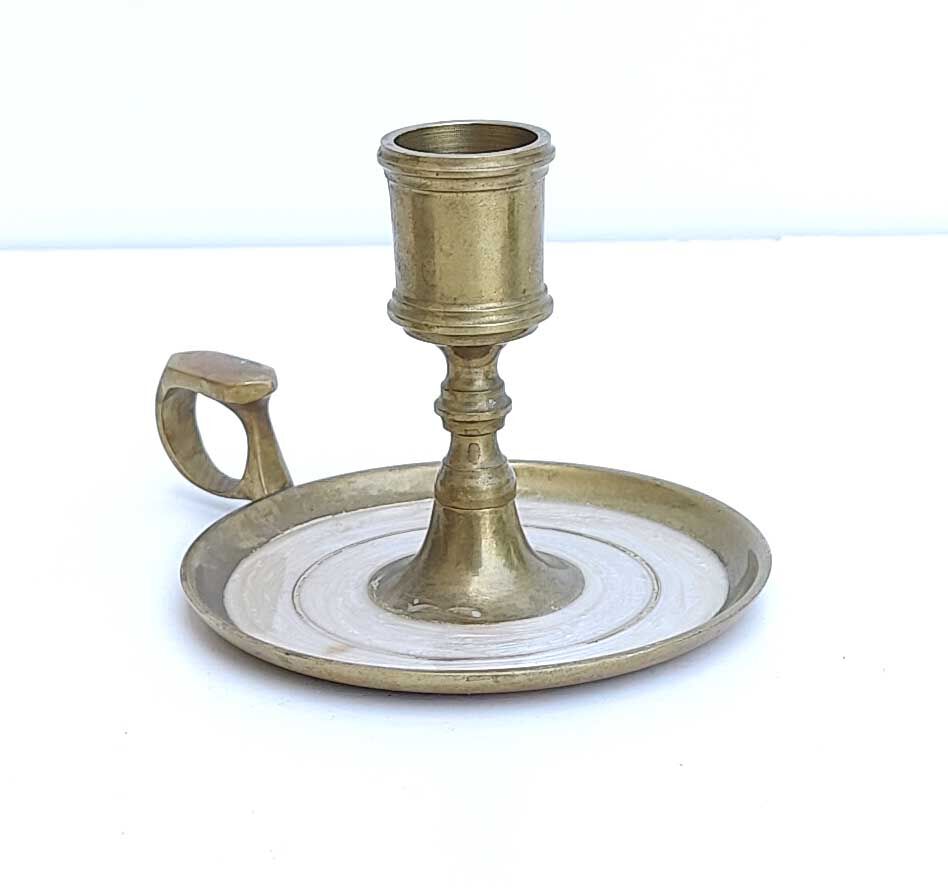Golden brass candle holder