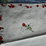 pair of monogrammed RB embroidered pillowcases in pink and red