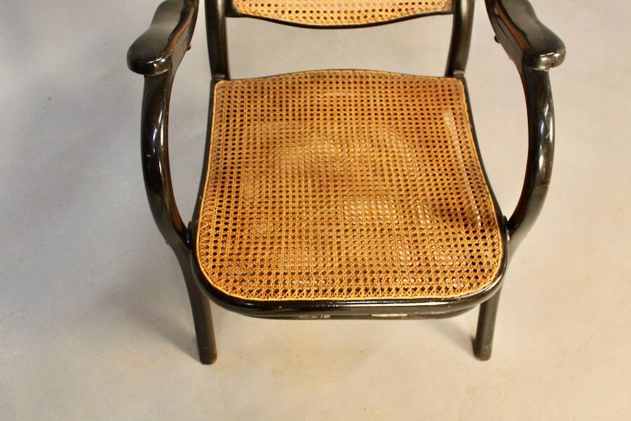 Bentwood cane armchair with mechanism and footrest