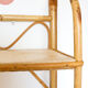 Rattan wall shelf