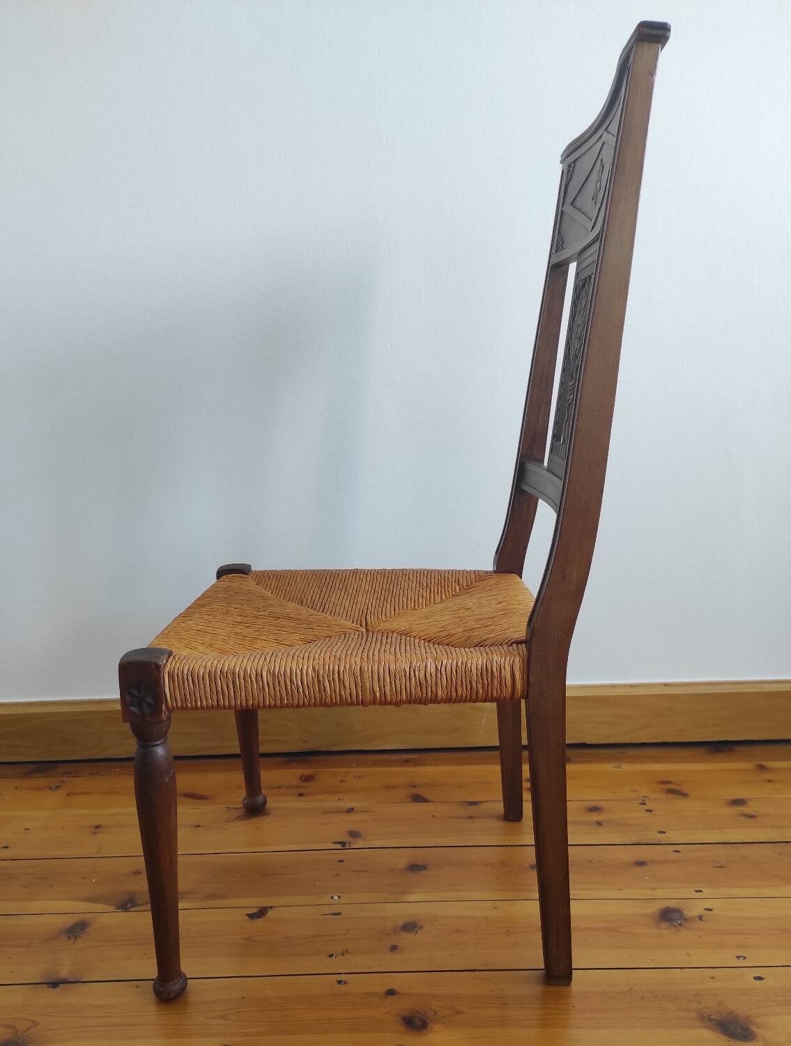 Armchair, low carved chair from the 19th century - decorated with wheat ears.