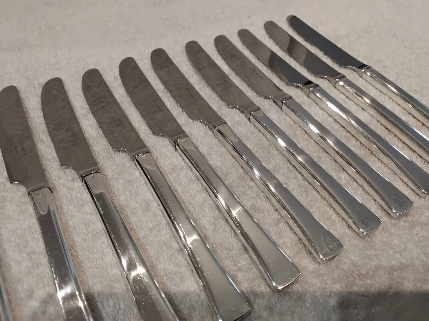 12 silver-plated dessert knives by Christofle Concorde, 19cm