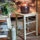 Old patinated painted wooden stool