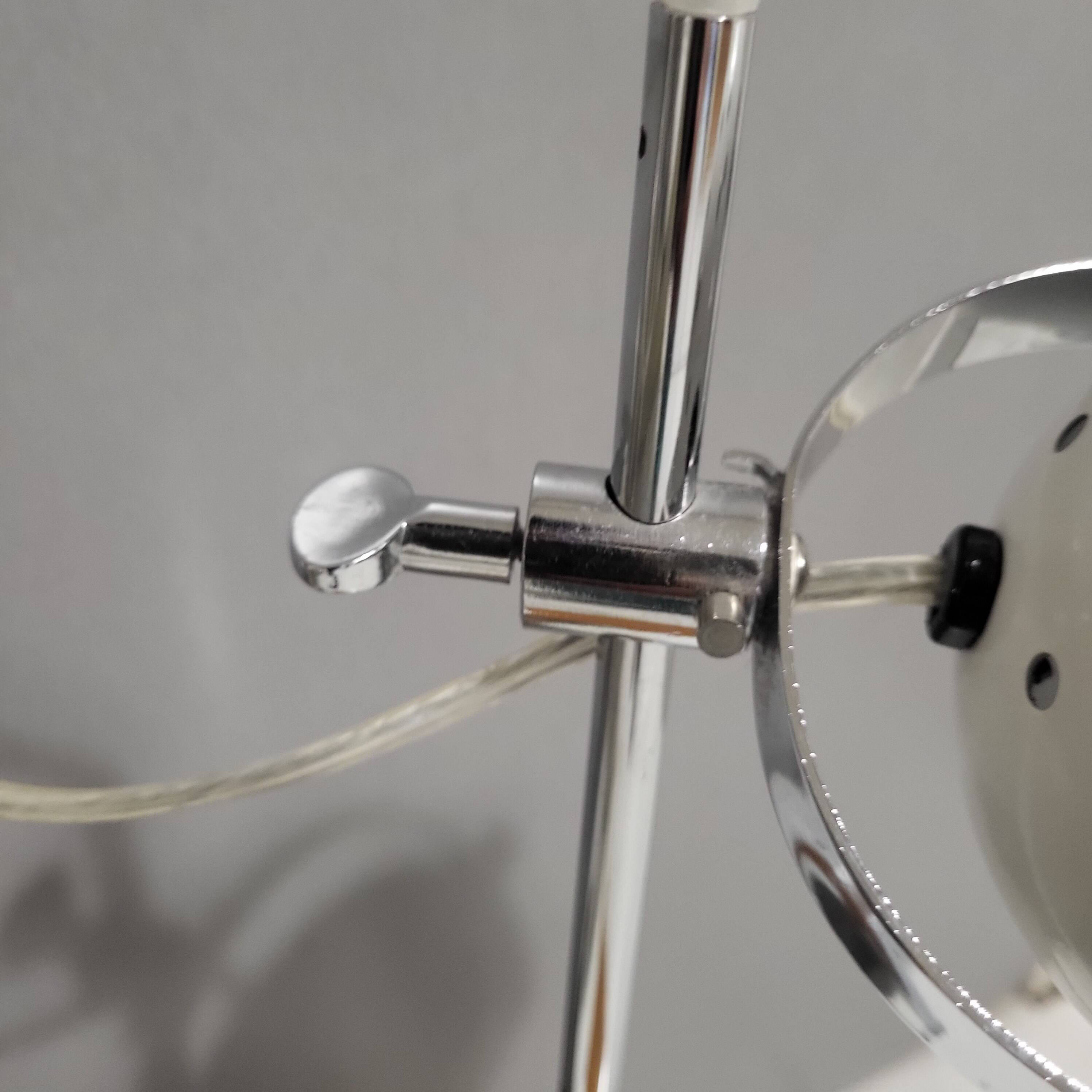 White and chrome metal eye ball lamps