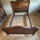 Very beautiful antique double bed in Louis XV style, made of wood and walnut veneer.