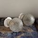 Set of two chiseled glass globe wall lights