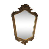 Old mirror gilded wooden frame and polychrome décor.