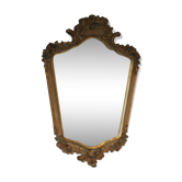 Antique mirror with gilded wooden frame and polychrome decoration.