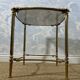 Small side table with a smoked glass top, Hollywood Regency.