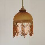 Vintage French amber mottled glass hanging ceiling light with beaded fringe.