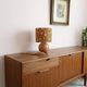 Table lamp with a wooden ball base, floral print in bohemian style.