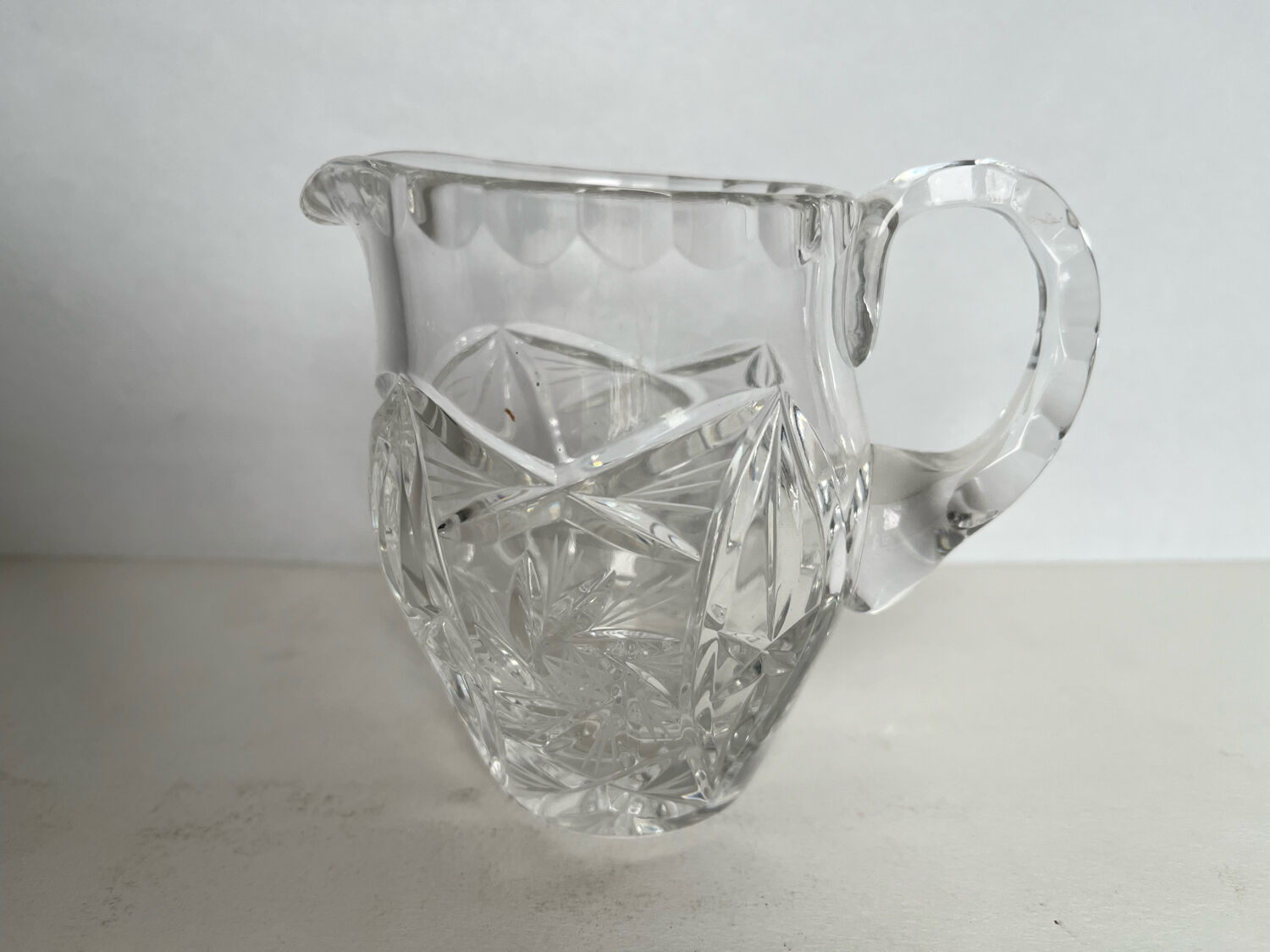 2 crystal pitchers