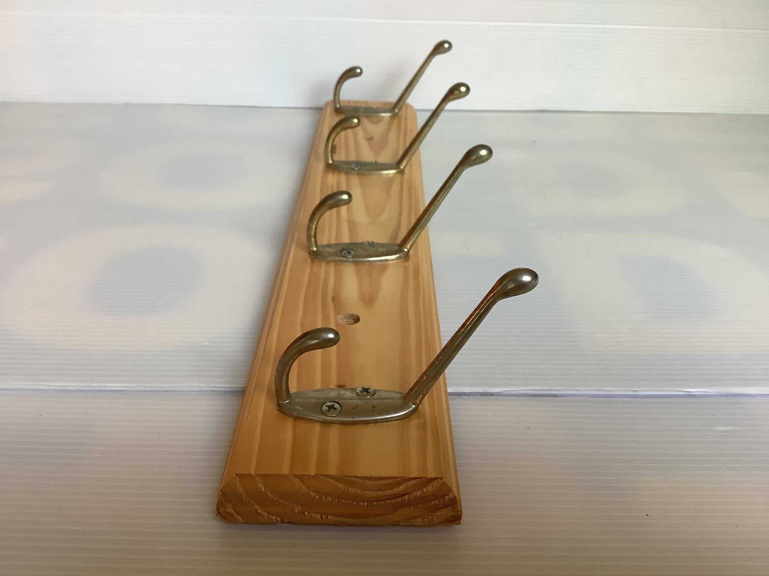 Wooden coat rack with four hooks
