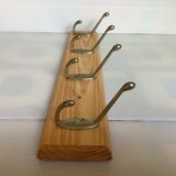 Wooden coat rack with four hooks
