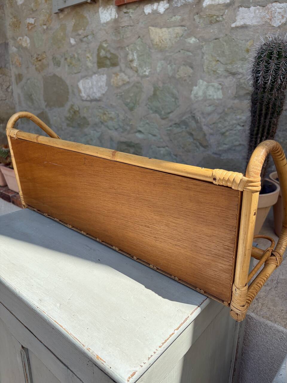 Superb and rare vintage rattan shelf.