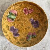Large round Sarreguemines slip dish with fruit decoration