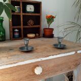 Pair of antique pewter candle holders