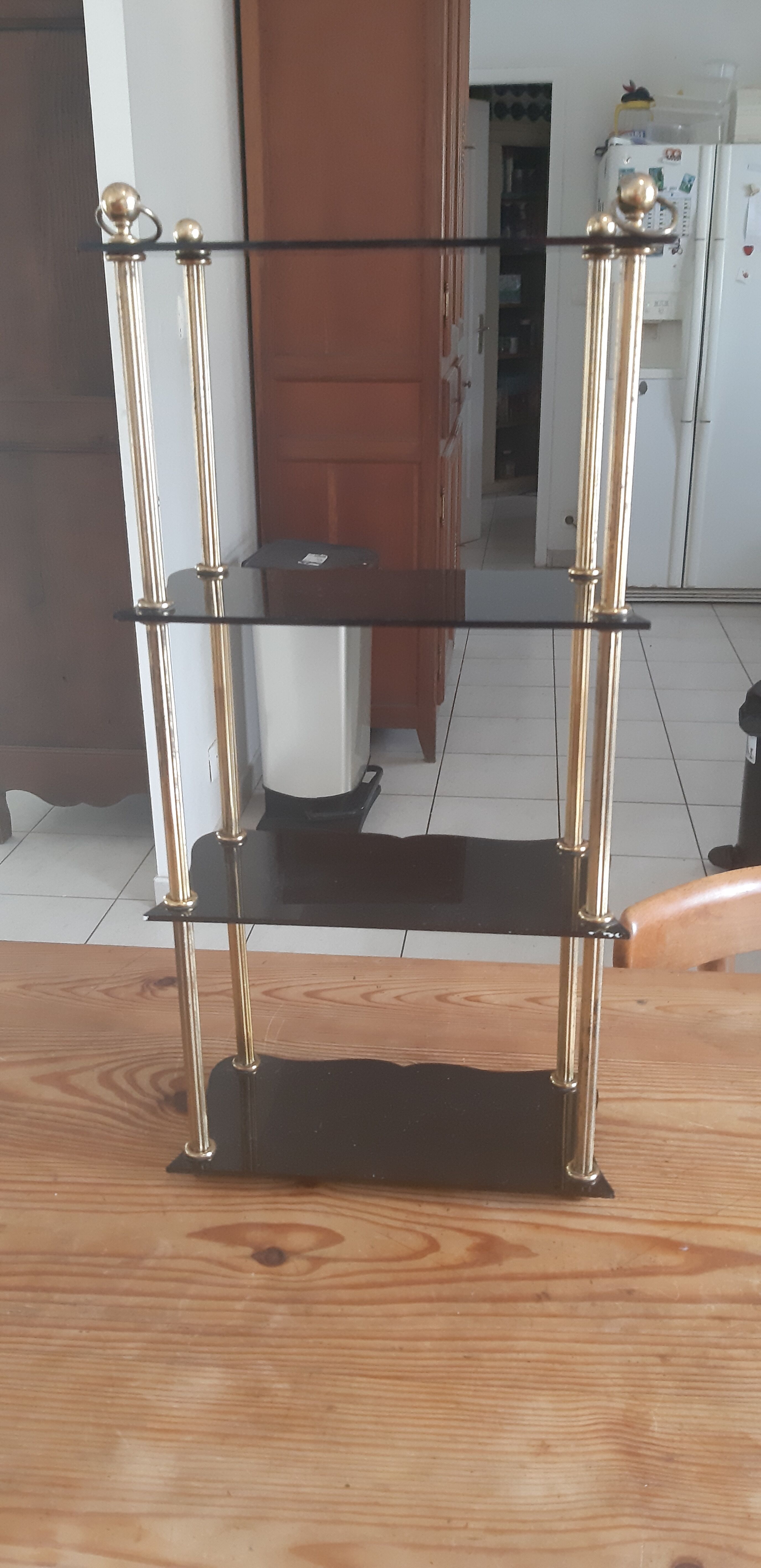 Vintage shelf of the 60s in golden metal and black plastic