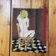 Painting nude woman sitting
