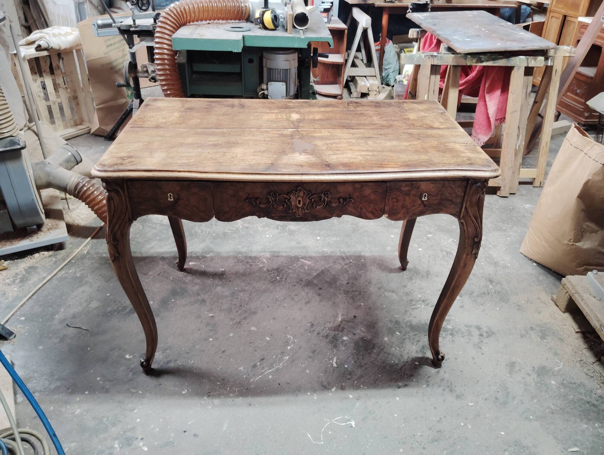 Louis XV desk with walnut burl.