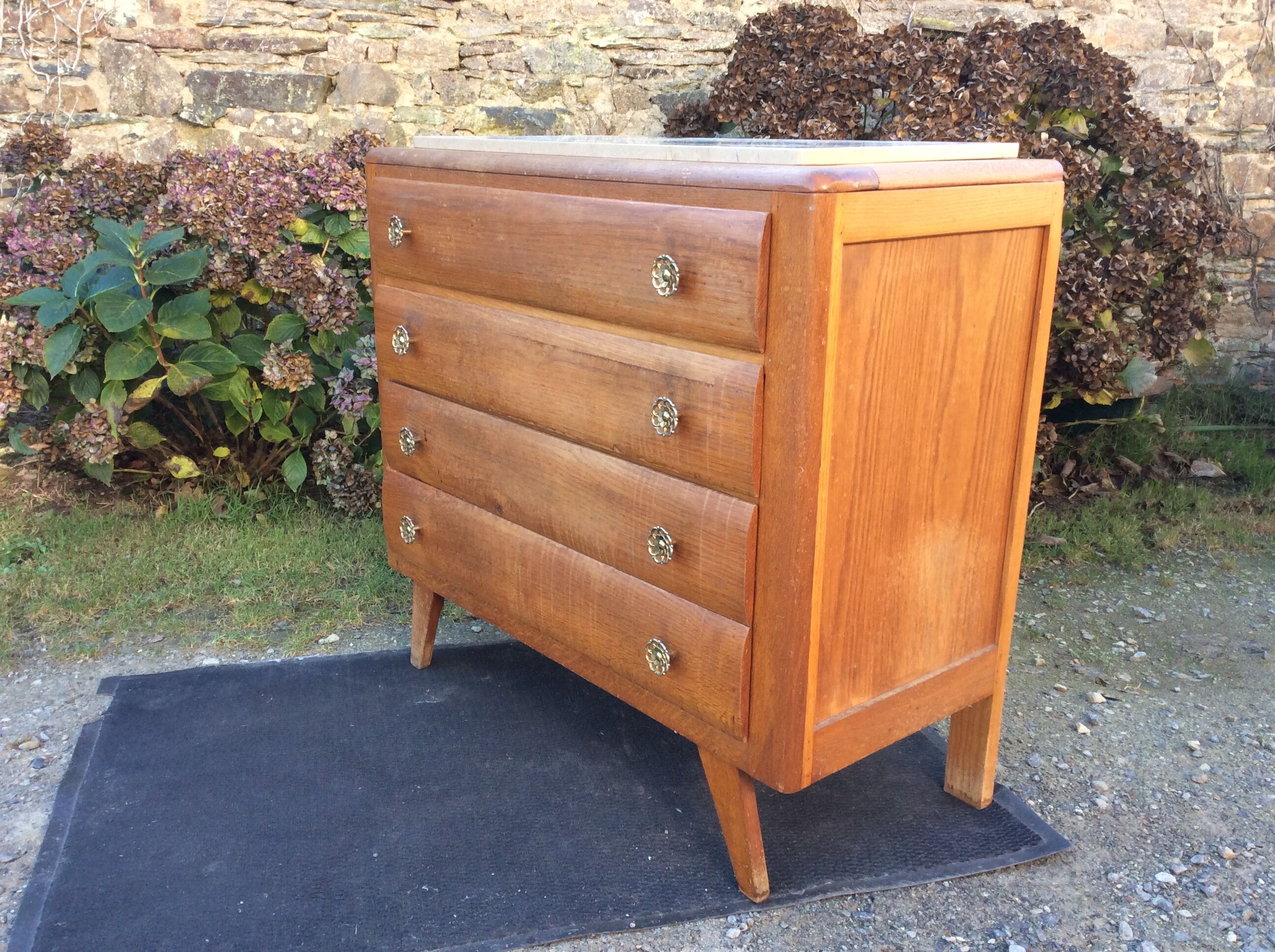 Vintage chest of drawers with oak compass base with marble top.