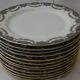 Set of 12 limoges porcelain dessert plates.
