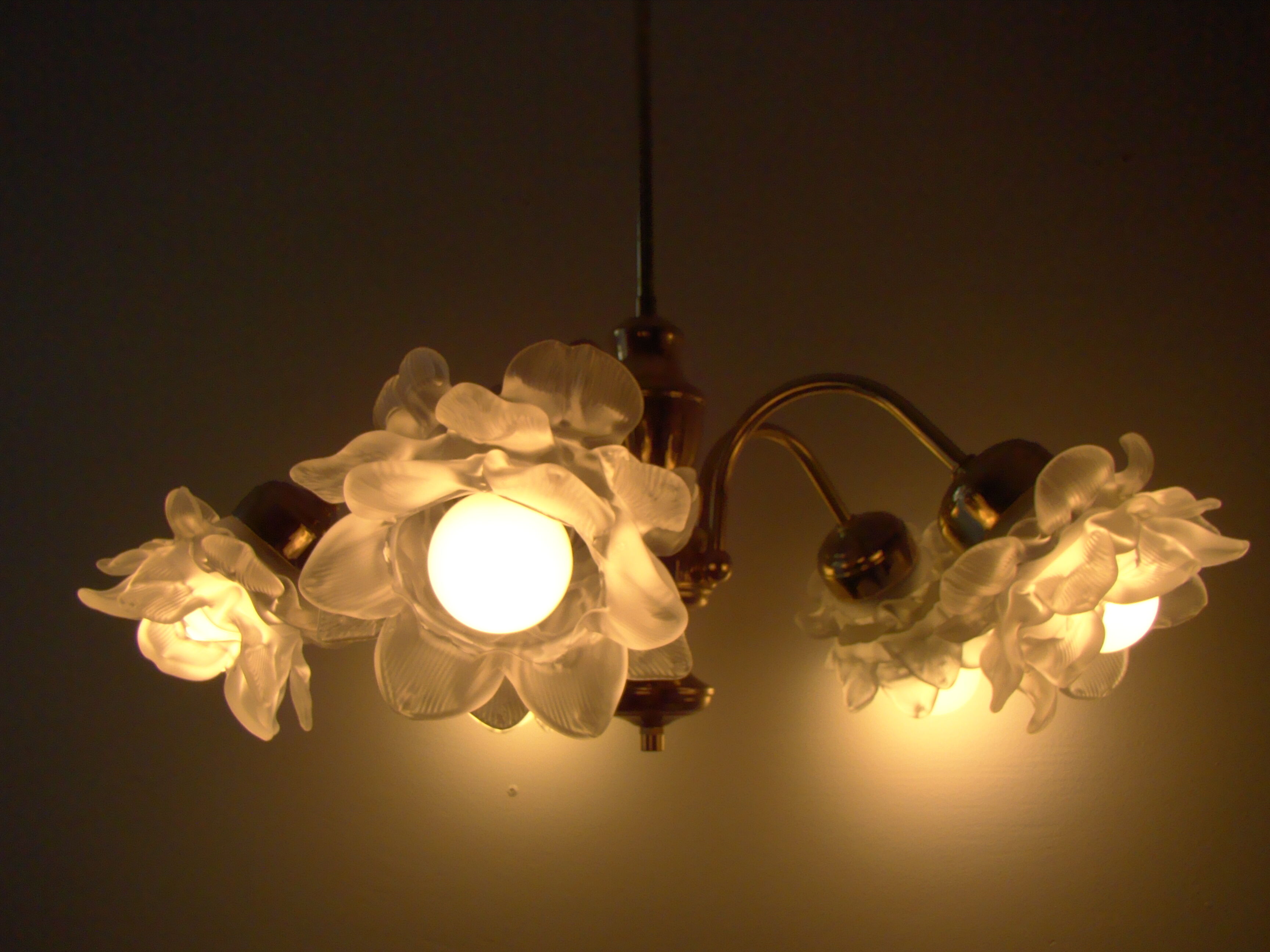 Vintage chandelier with roses in glass paste