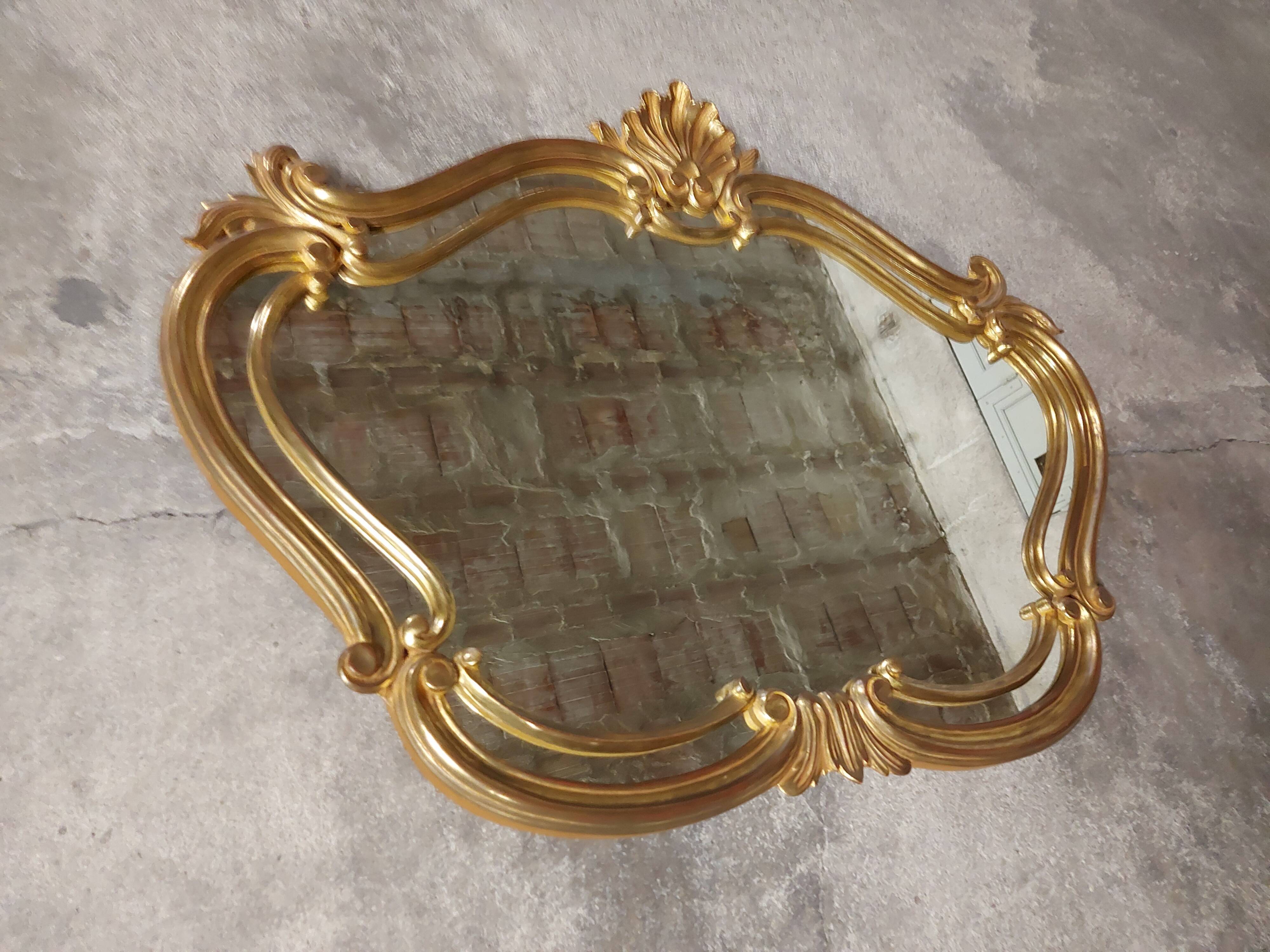 Old gilded wood mirror