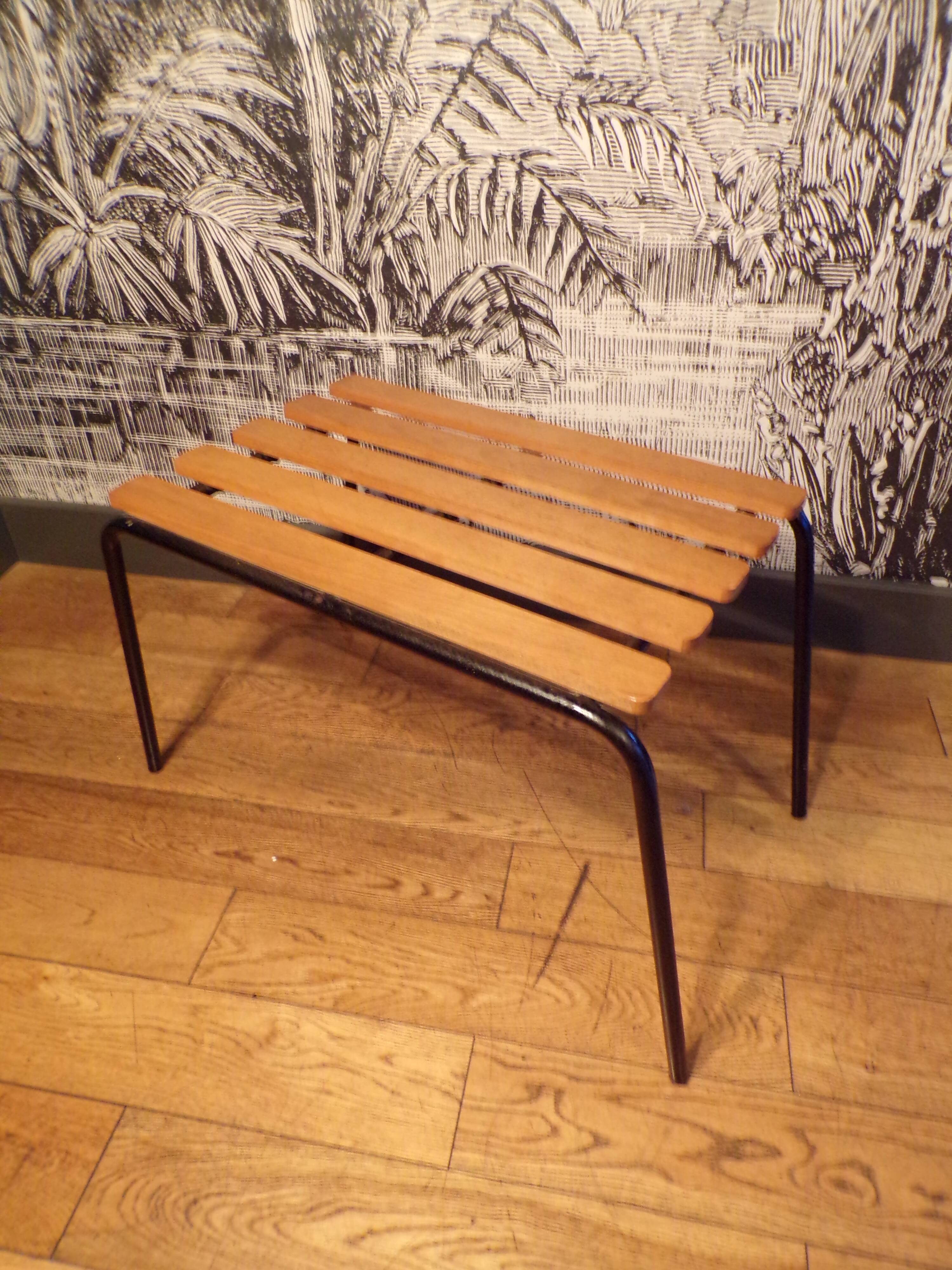 Old 1950s suitcase bench with wooden slats