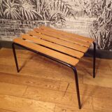 Old 1950s suitcase bench with wooden slats